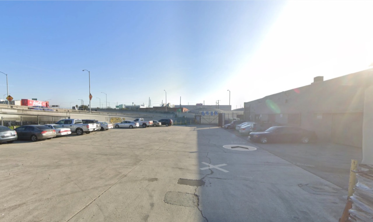 Cars parked along the side of the alley and in the cul-de-sac